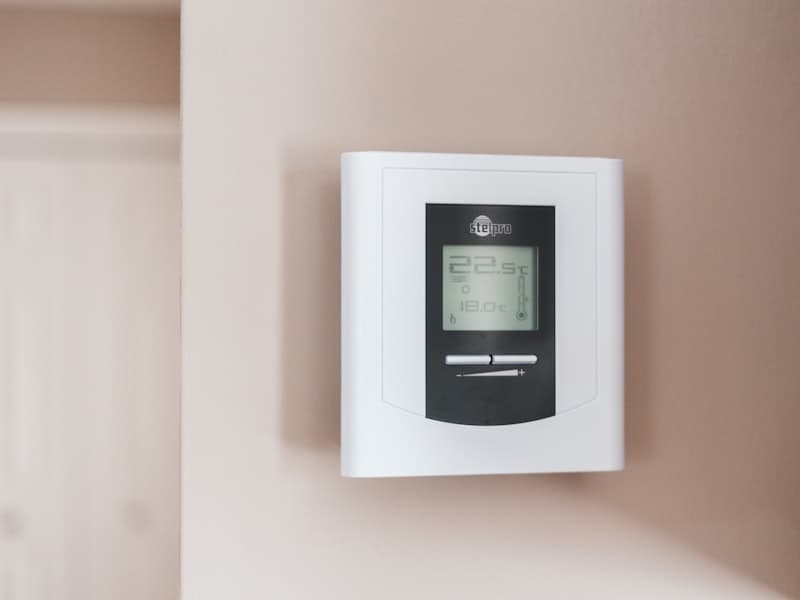 Thermostat controlling home heating
